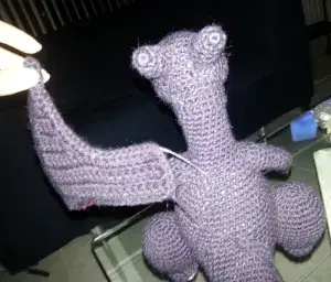 Stick The Long Double Wire Near His Neck In The Middle Of His Back