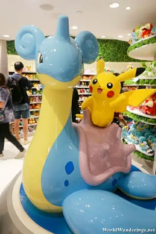 Statue Of Pikachu On A Lapras At The Pokemon Center Singapore