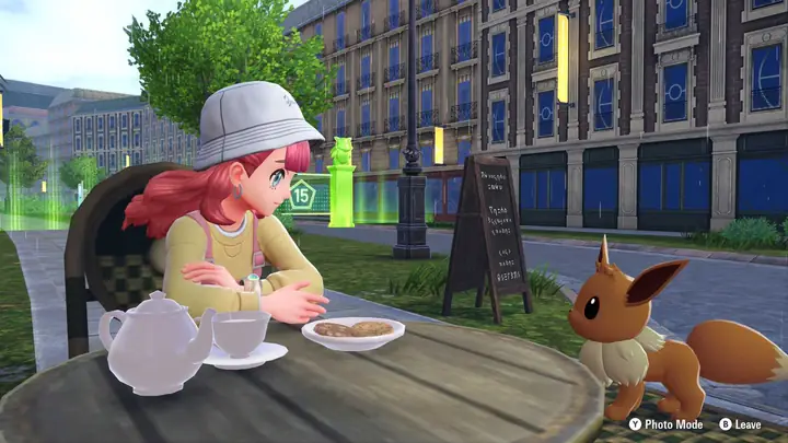 A Trainer Sat With An Eevee At A Cafe In Pokemon Legends: Z-a.